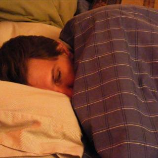man sick in bed