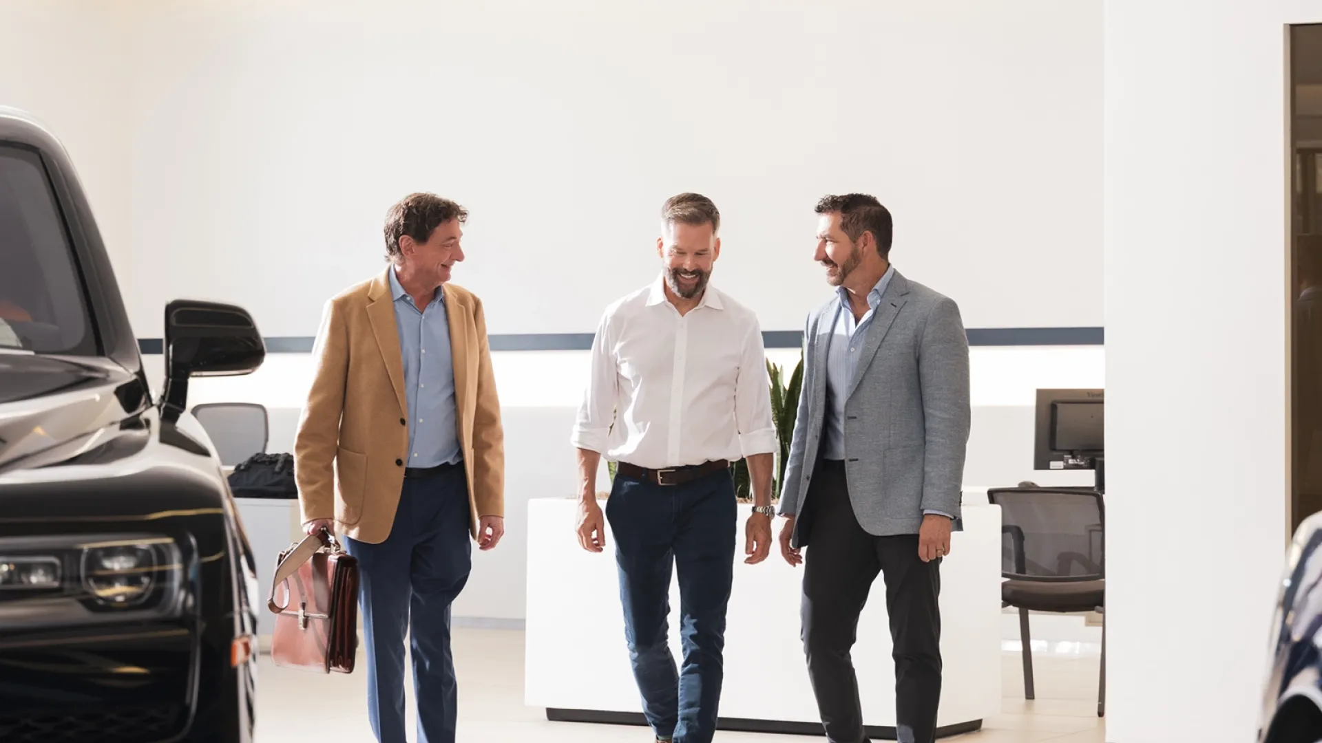 two experienced lawyers counsel their auto dealership client 
