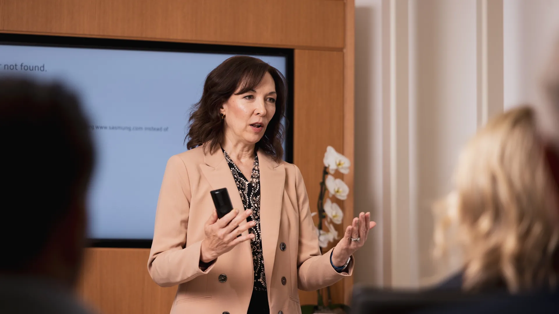 An experienced and top rated labor and employment lawyer conducts a compliance training at an auto dealership for employees